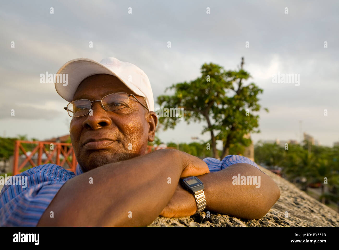 Portrait of a middle-aged Colombian man on the colonial wall (la muralla), Cartagena, Colombia Stock Photo