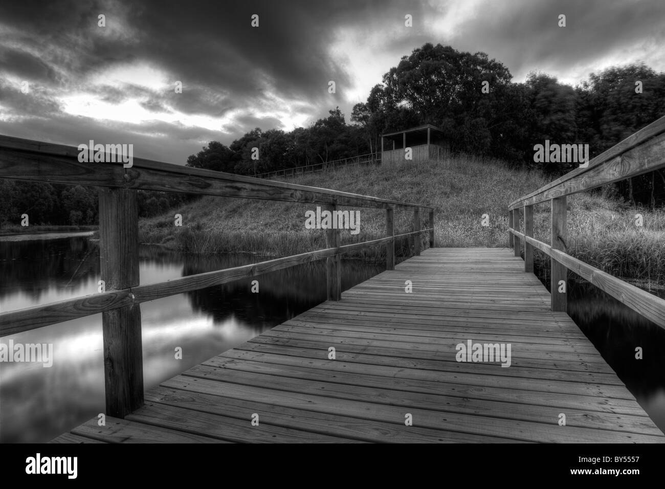 A high dynamic range image of a lookout and boardwalk in black and white. Stock Photo