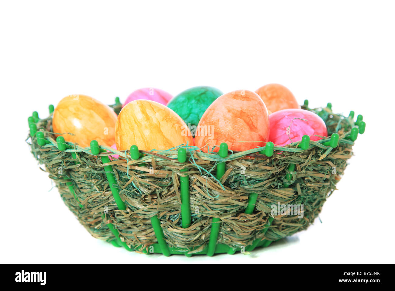 Colored easter eggs in a basket. All on white background Stock Photo ...