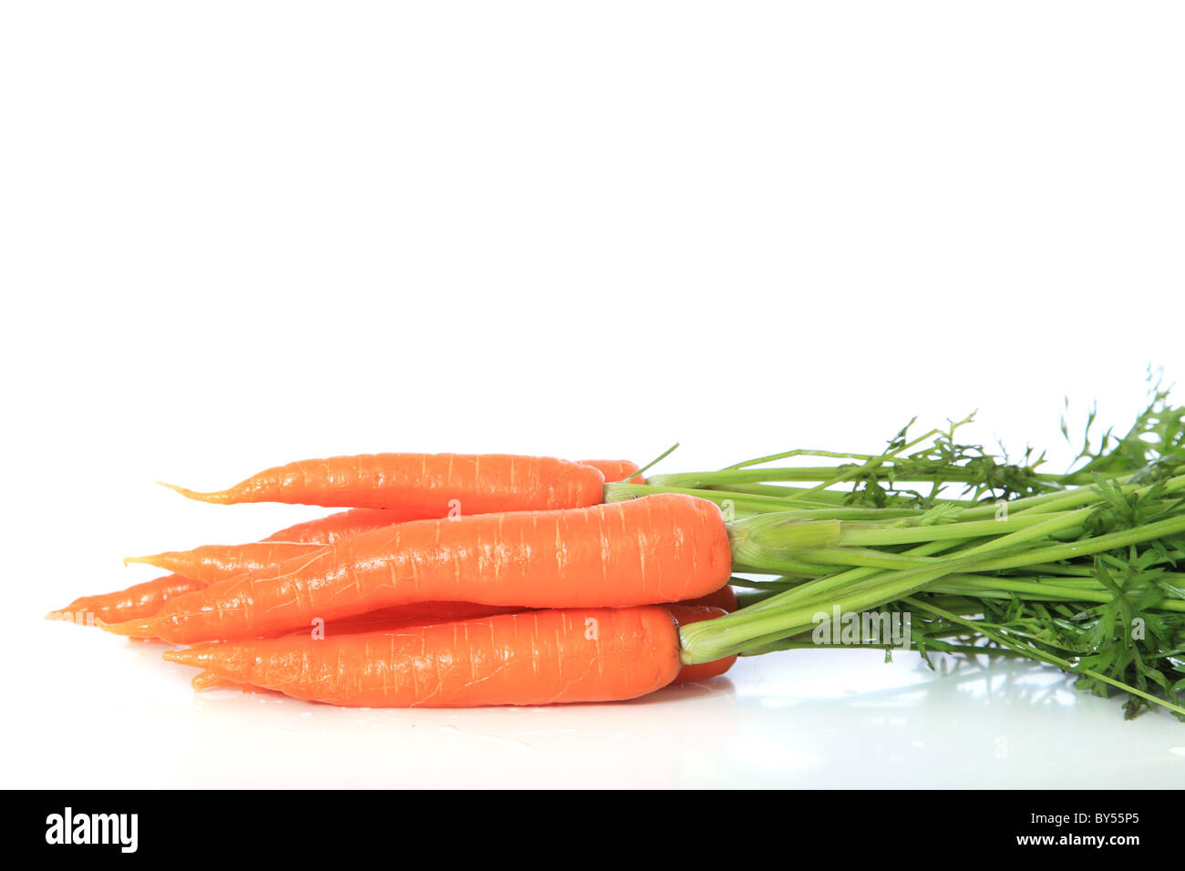 Fresh carrots. All on white background. Stock Photo