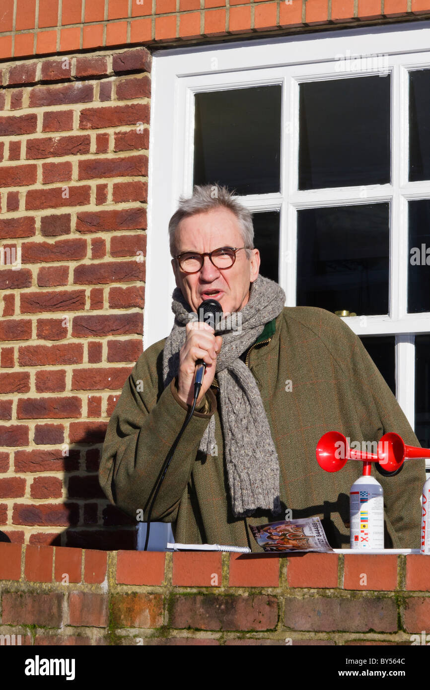 Actor Larry Lamb speaking as he prepares to start the 2010 St Albans Jingle Bell Jog charity  fun run Stock Photo
