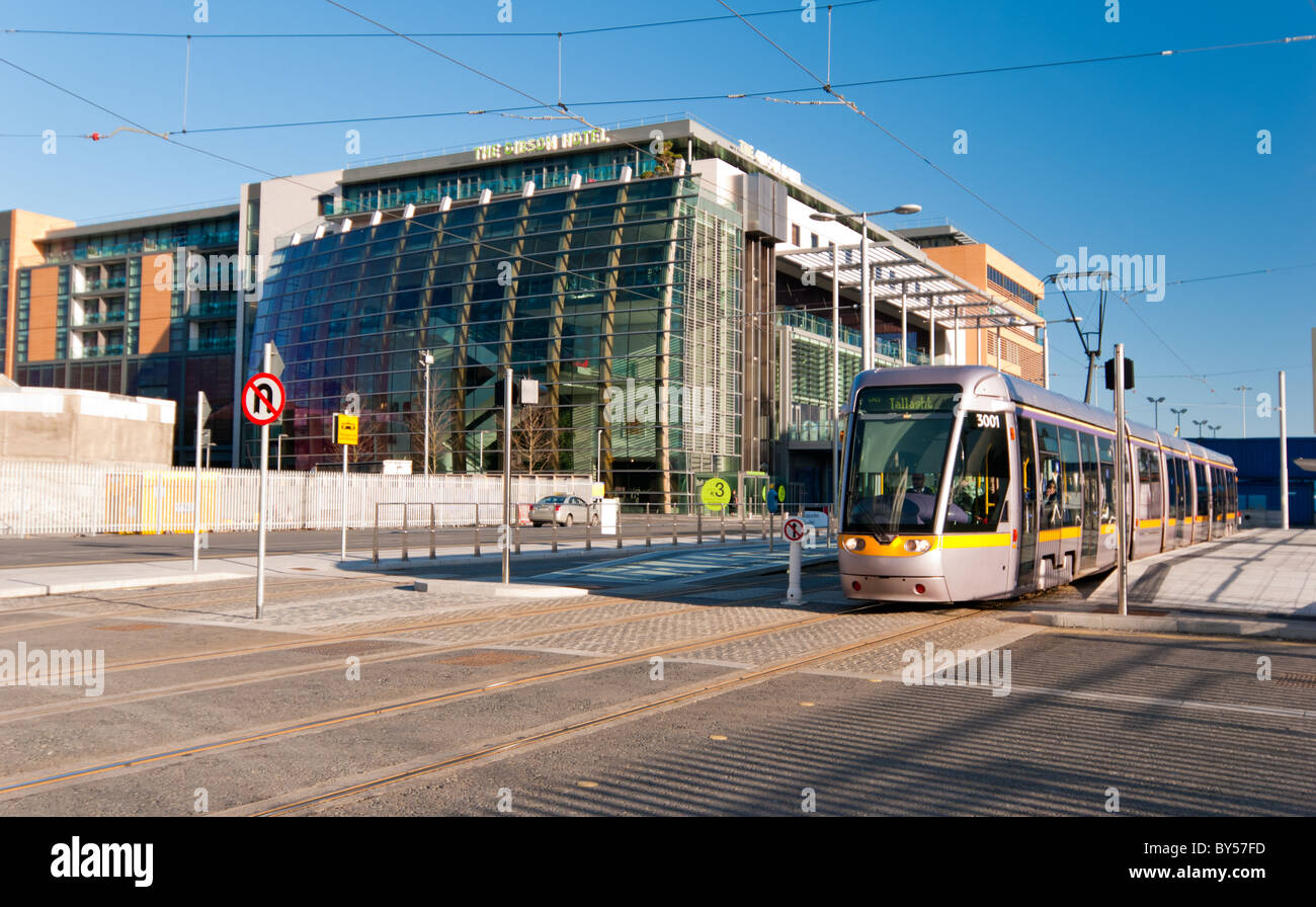 LUAS Tram outside the Gibson Hotel Stock Photo