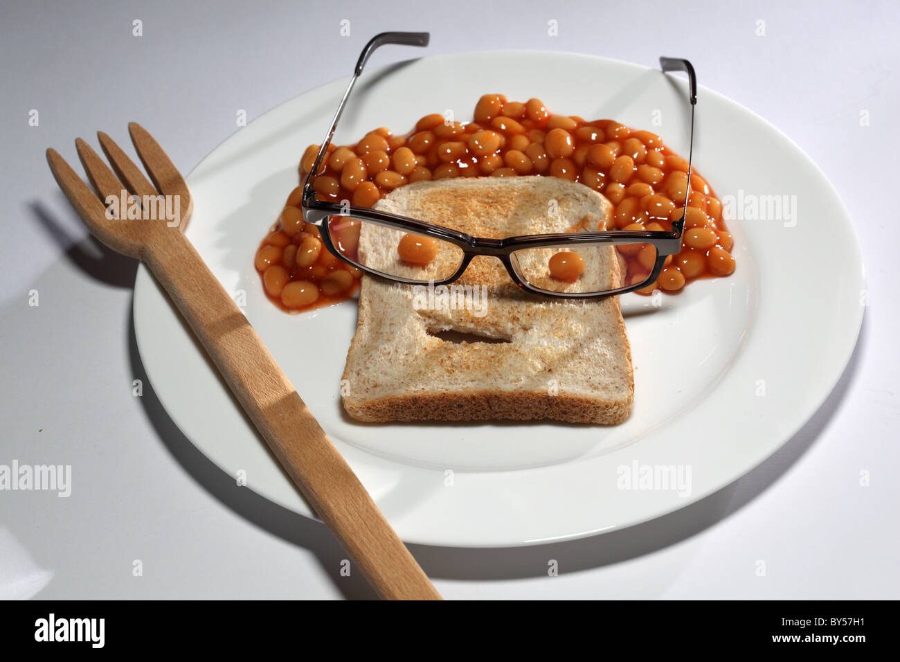 baked beans toast bread funny face glasses Stock Photo Alamy