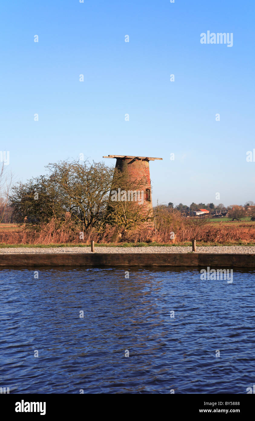 The remains of Ludham Bridge Drainage Mill on the north bank of the