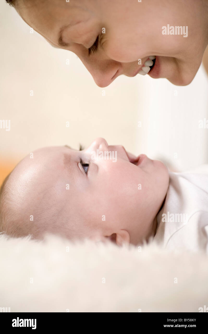 A mother and her baby boy, close-up, face to face Stock Photo