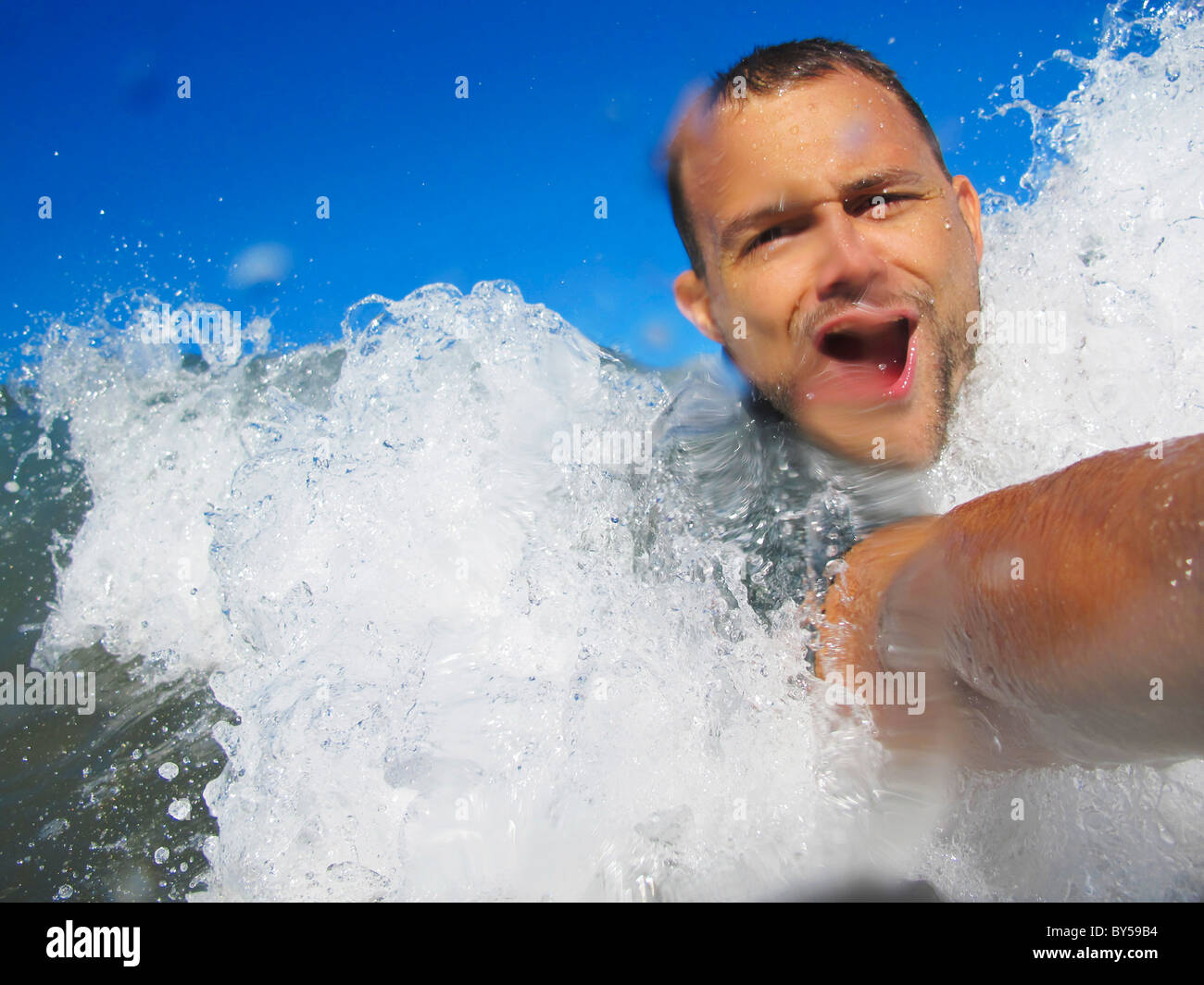 Body surfing man Stock Photo