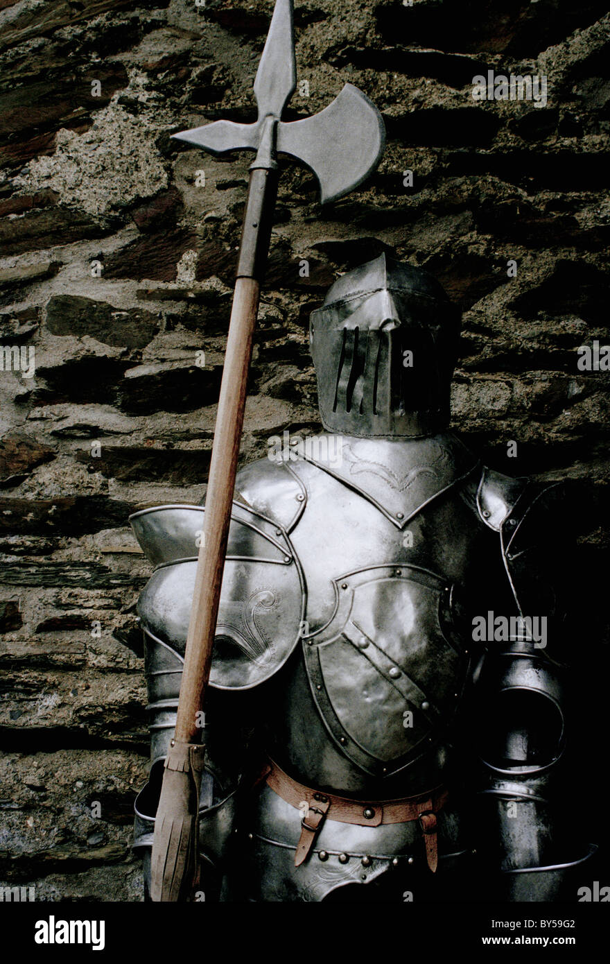 Suit of armor with an axe Stock Photo Alamy