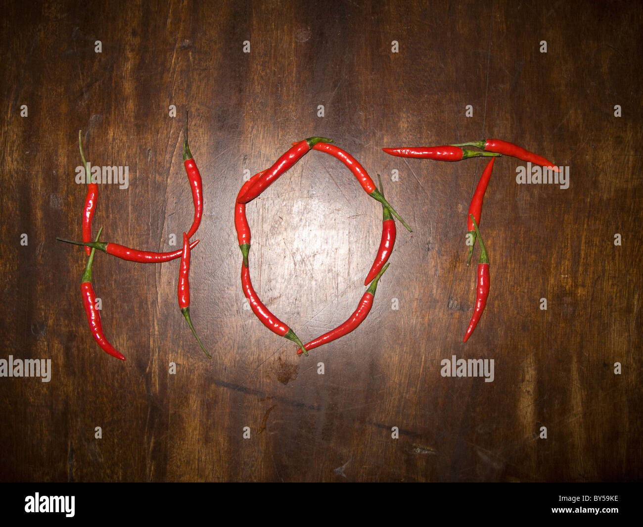 Red chili peppers spelling the word HOT Stock Photo Alamy
