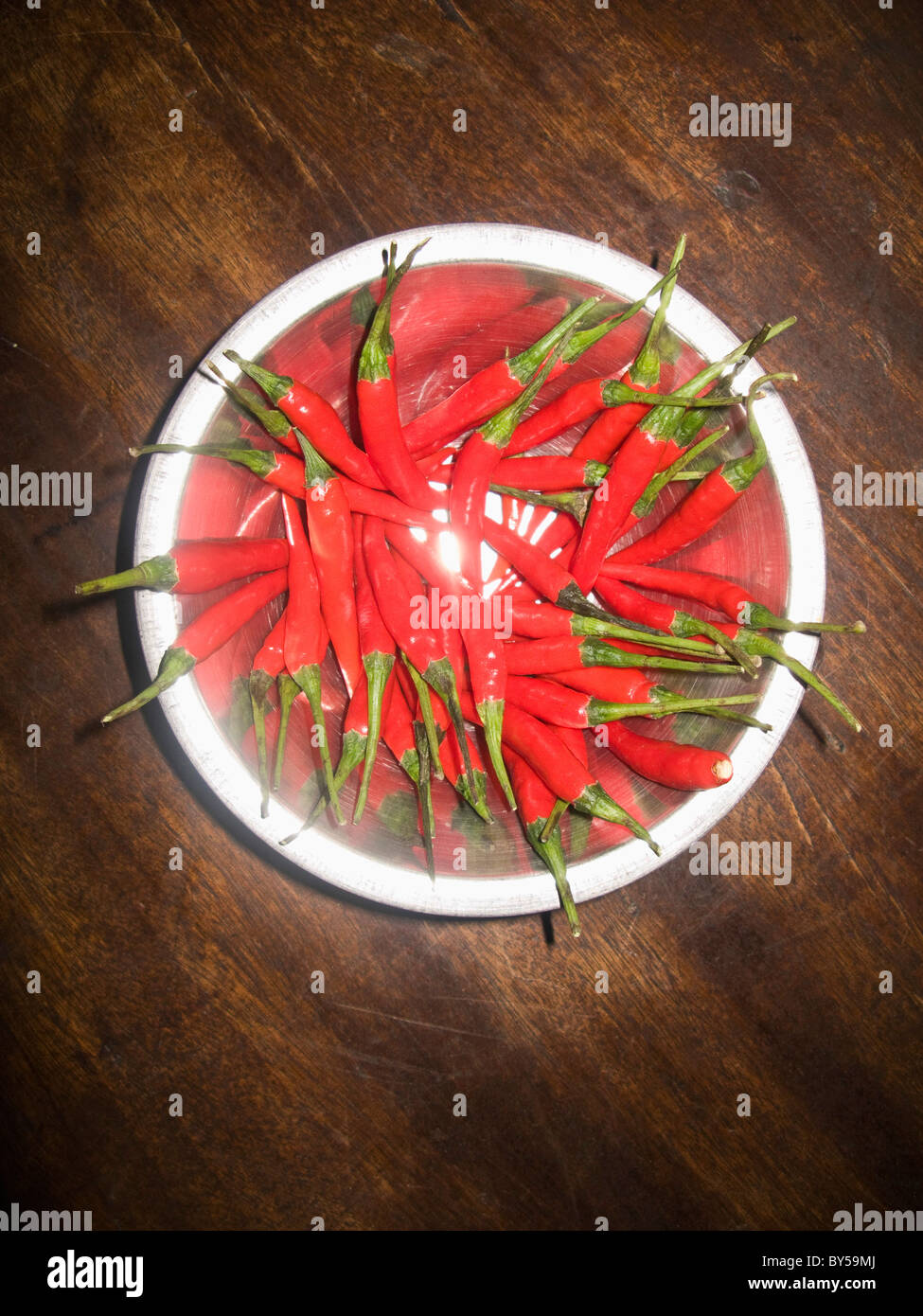 A bowl of red chili peppers Stock Photo - Alamy