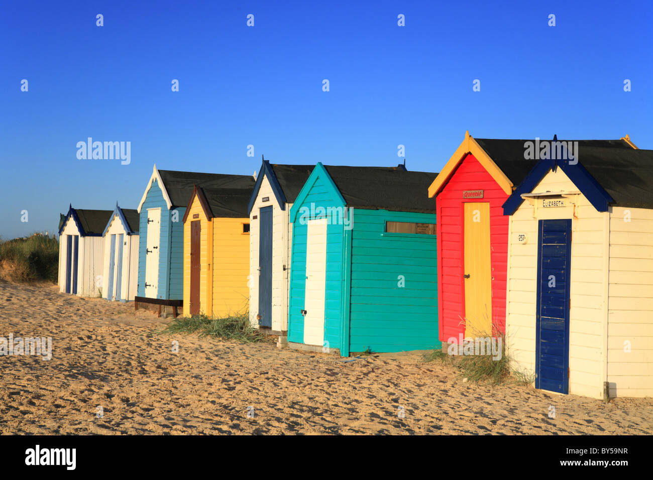 Row of colourful beach huts, Southwold Suffolk Stock Photo