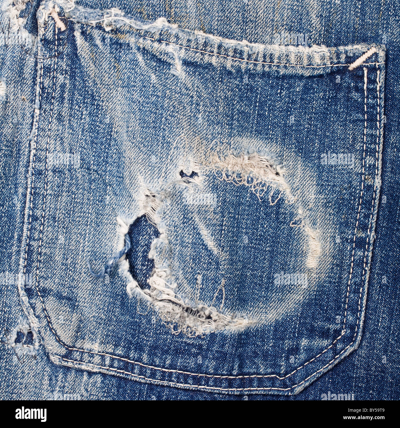 Worn out jean pocket Stock Photo