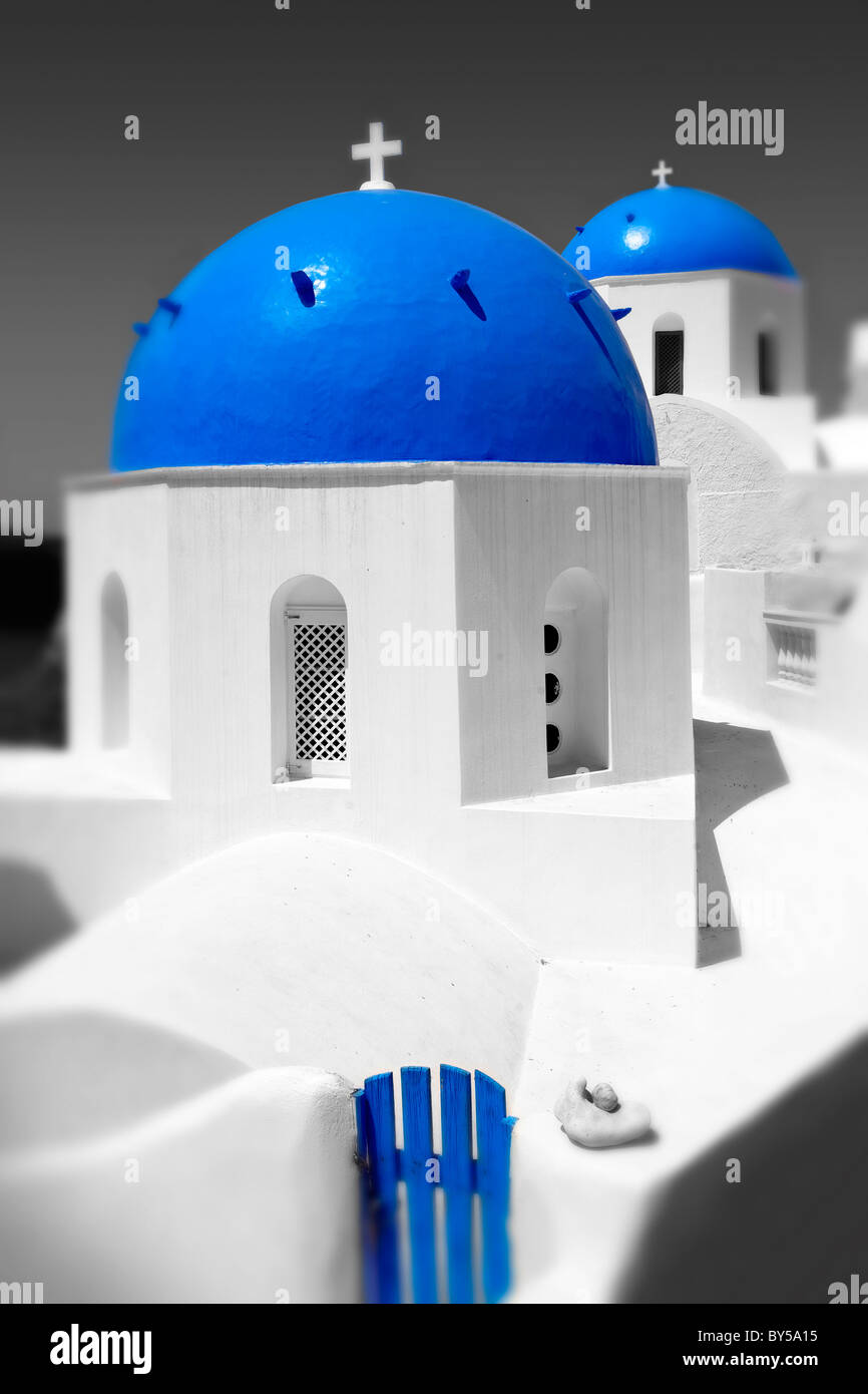 Oia, ( Ia ) Santorini - Blue domed Byzantine Orthodax churches, - Greek Cyclades islands - Photos, pictures and images Stock Photo