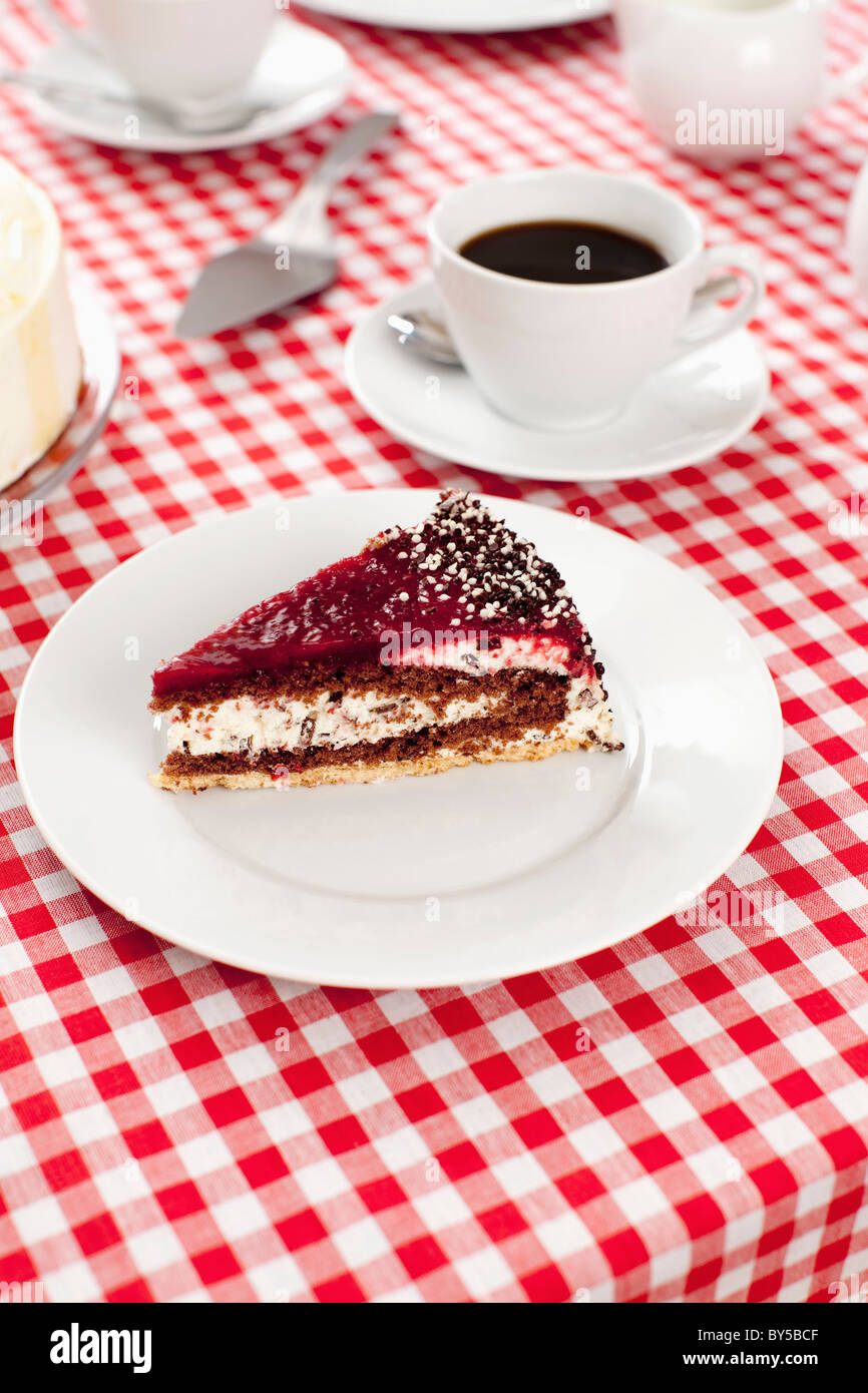 A slice of cake and cup of coffee Stock Photo