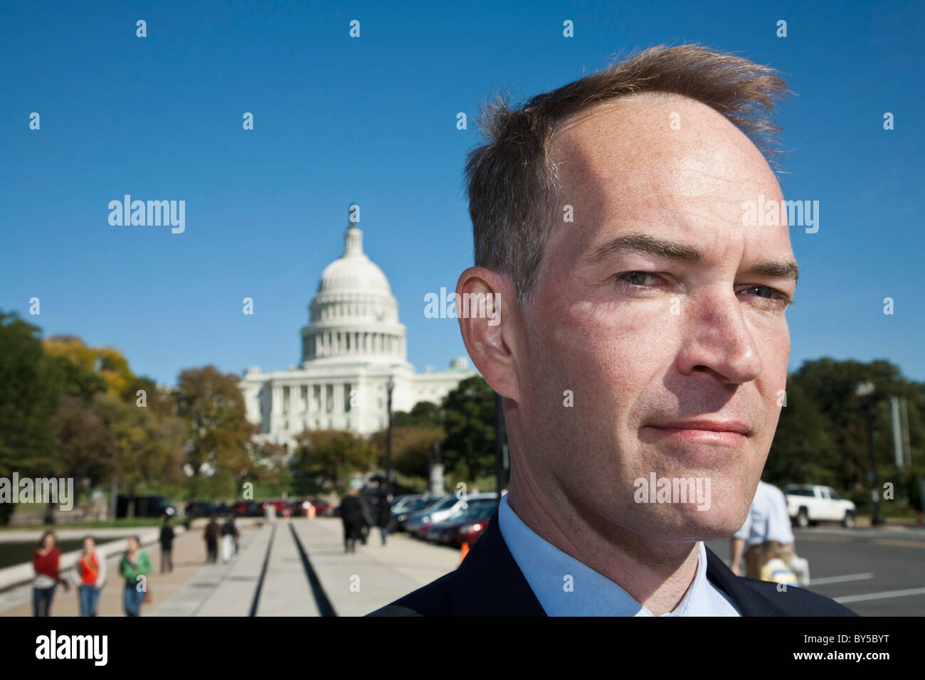 A politician in front of the US Capitol Building Stock Photo