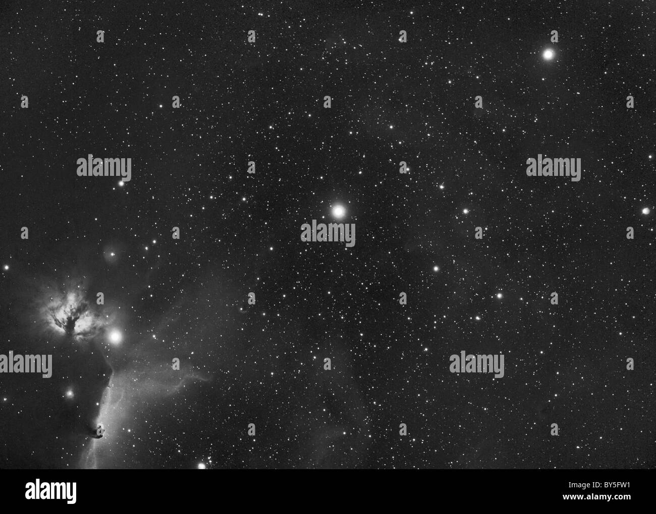 The stars of Orions Belt with the Flame Nebula and Horsehead Nebula  photographed in narrowband Hydrogen Alpha over 5 hours Stock Photo - Alamy