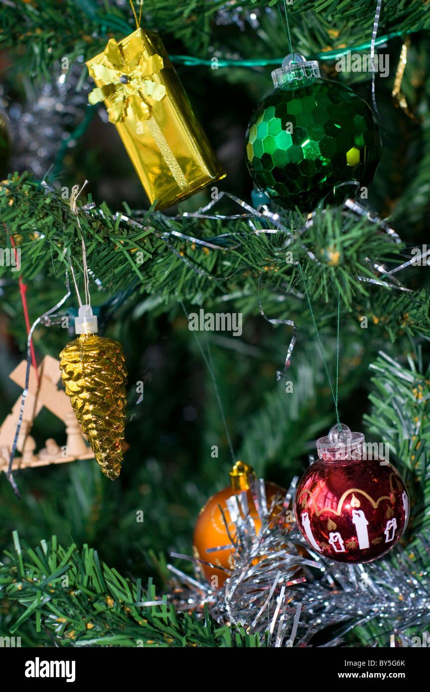 Decorations hanging on a Christmas tree Stock Photo - Alamy