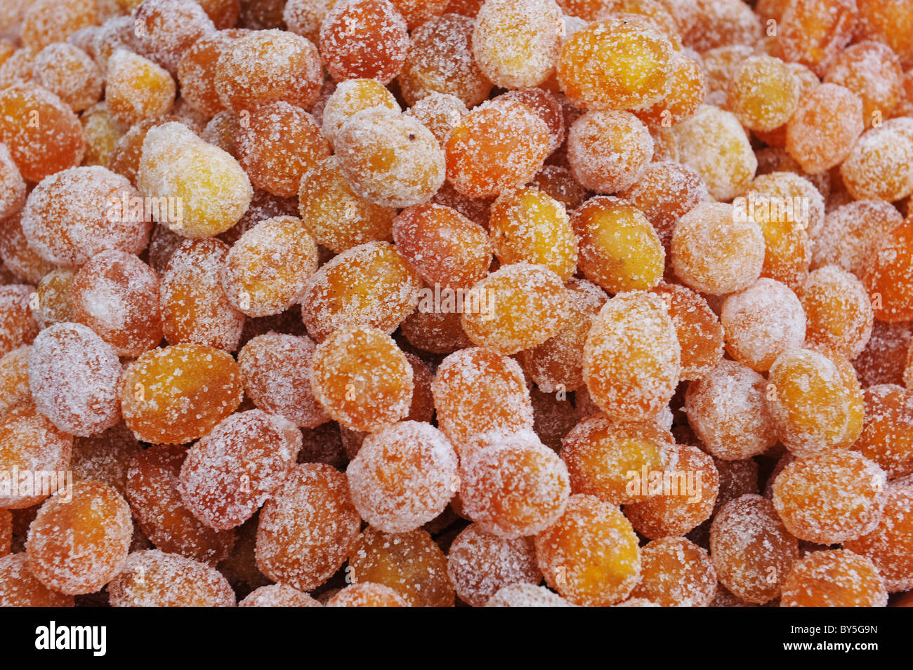 kumquat candies fruits with sugar for sweet dessert Stock Photo