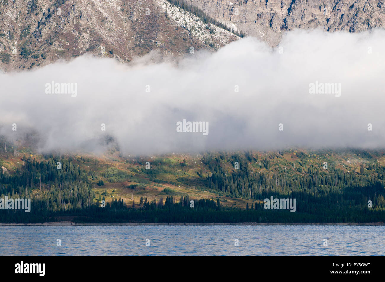 Clearing fog on Jackson Lake in the morning Stock Photo