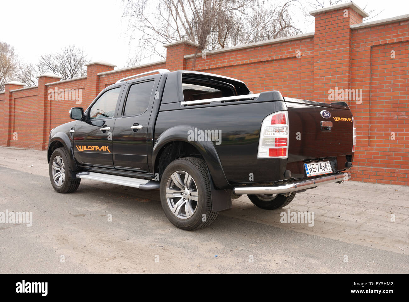 Ford Ranger 3.0 TDCi Wildtrak 4x4 - MY 2010 - black metallic - Double Cab - German pick-up - city, park space Stock Photo