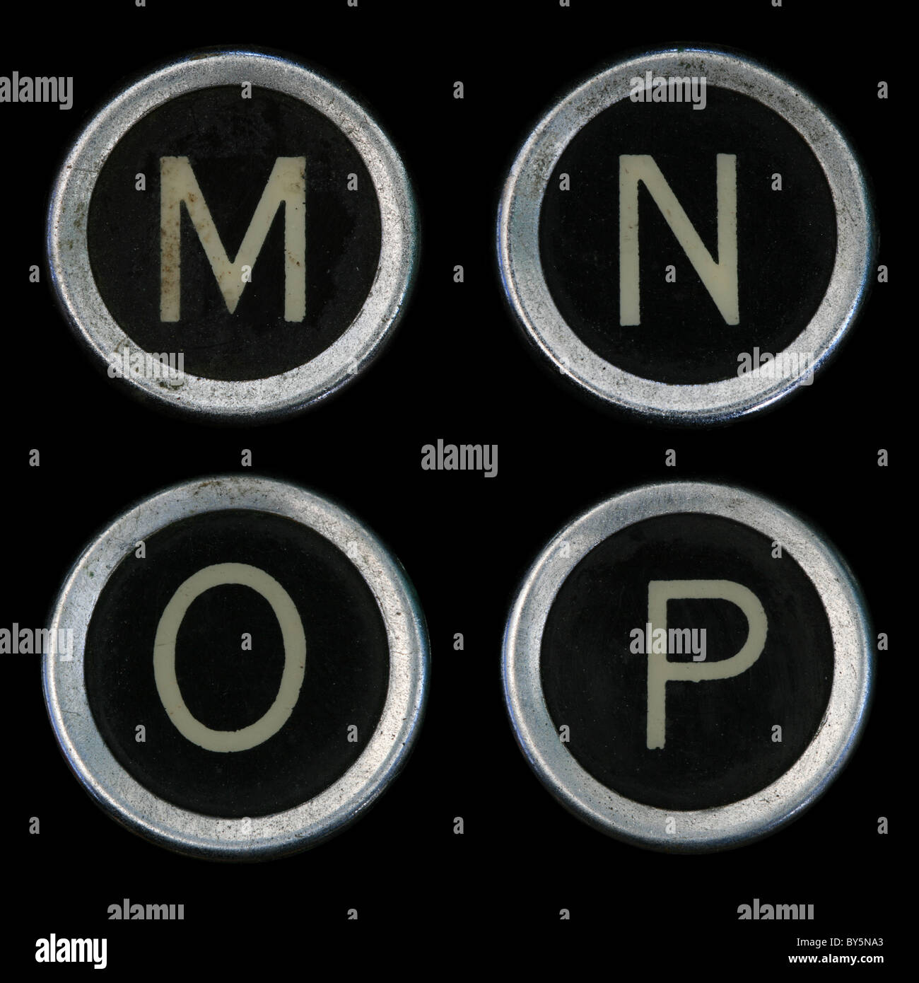 M N O P keys from old typewriter on black background Stock Photo