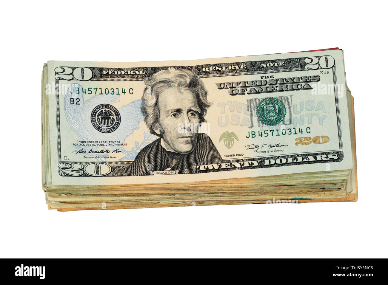 a stack of United States twenty dollar bills isolated on white background Stock Photo