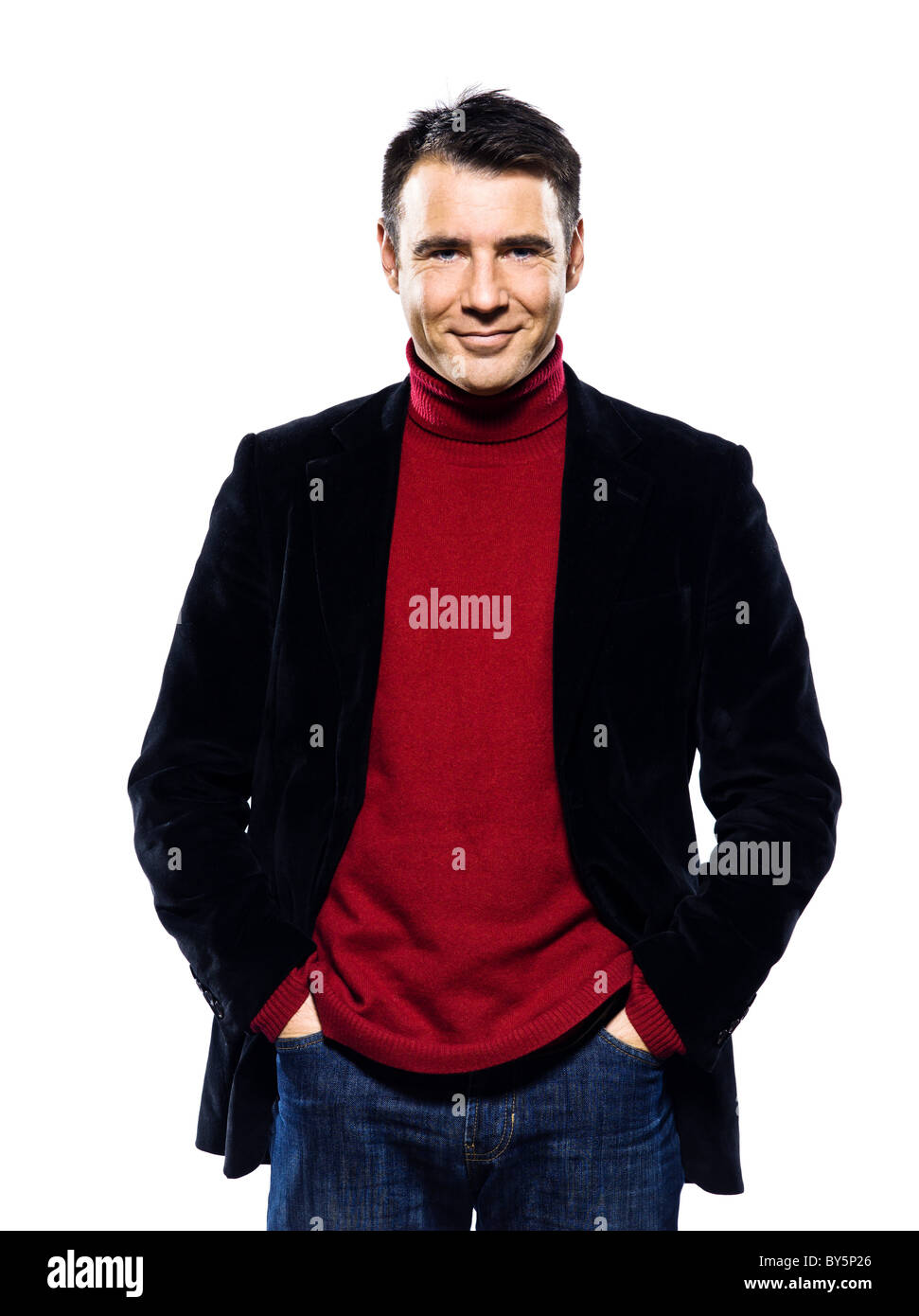 one caucasian handsome man portrait smiling cheerfull looking at camera hands in pocket  studio portrait on isolated white background Stock Photo