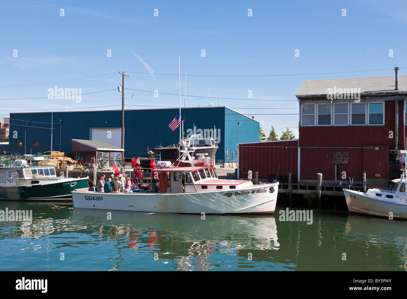 Tourists on commercial charter lobster boat Bailey & Bella in Portland, Maine Stock Photo