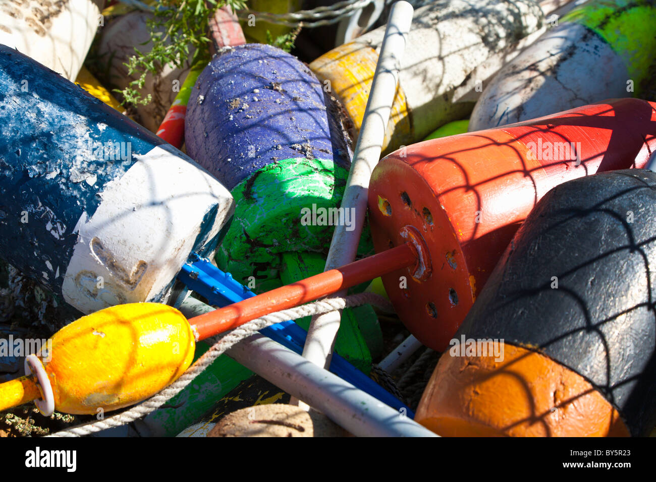 A pile of lobster buoys on a dock in Portland, Maine Stock Photo Alamy