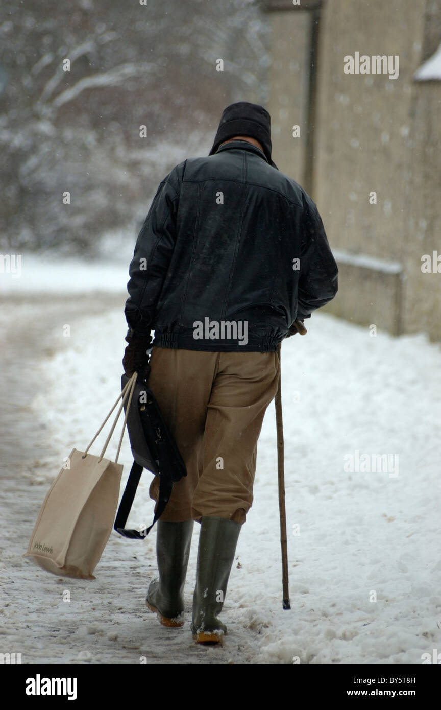 Man in the snow Stock Photo