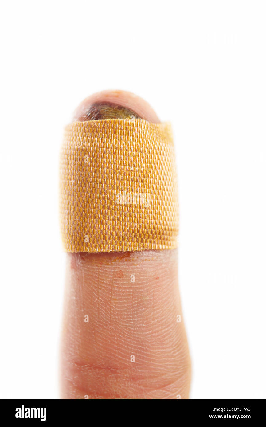 Plaster wrapped around wounded finger Stock Photo