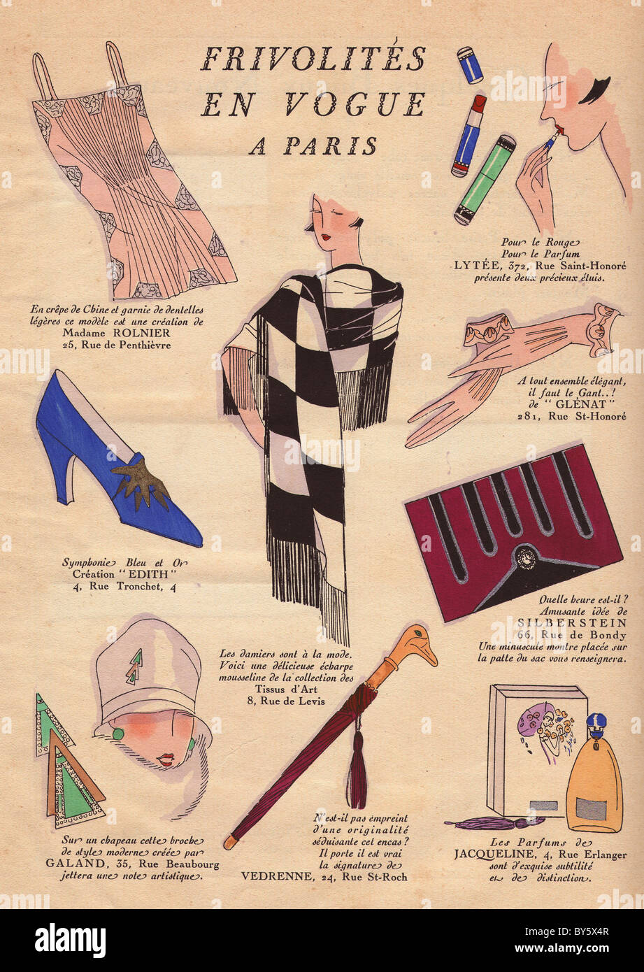 Pink crepe slip, lipsticks, black and white shawl, gloves, purse