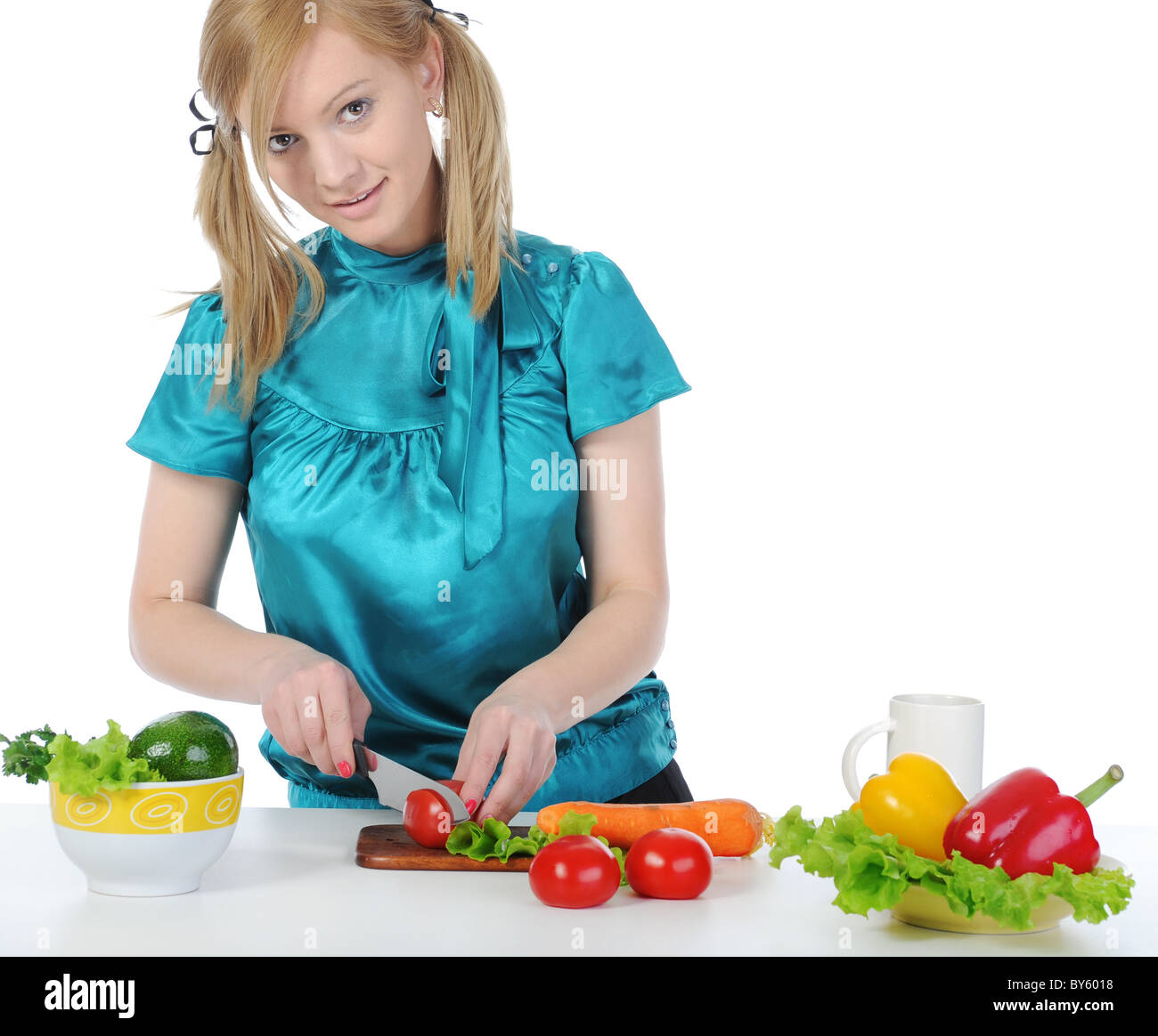 Young woman preparing breakfast. Stock Photo