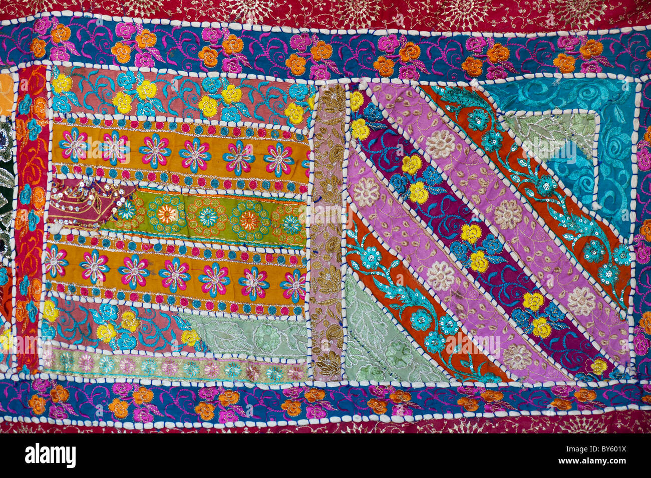 Multicoloured indian fabric wall hanging. Indian craftwork Stock Photo