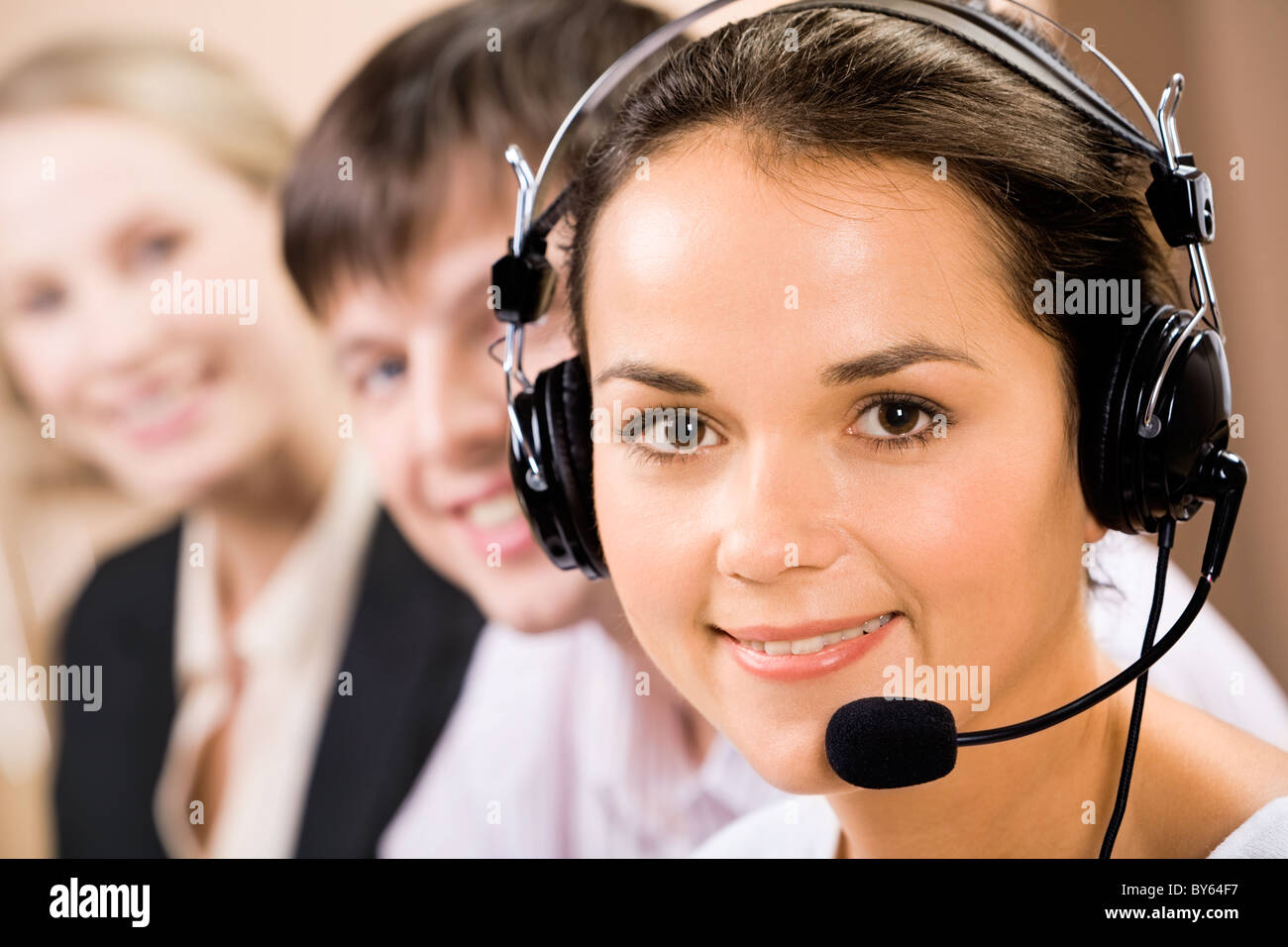 Portrait of friendly telephone operator with headset Stock Photo Alamy