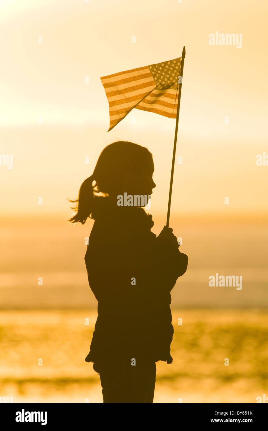 Young Girl Holding American Flag Stock Photo - Alamy