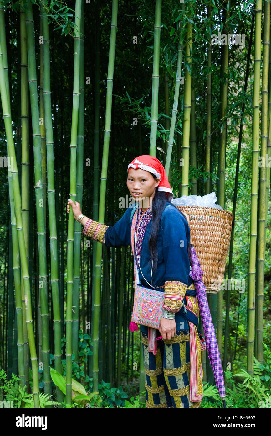 Red Dzao ethnic woman in Sapa to Ta Phin village road, Lao Cai province, Vietnam. Stock Photo