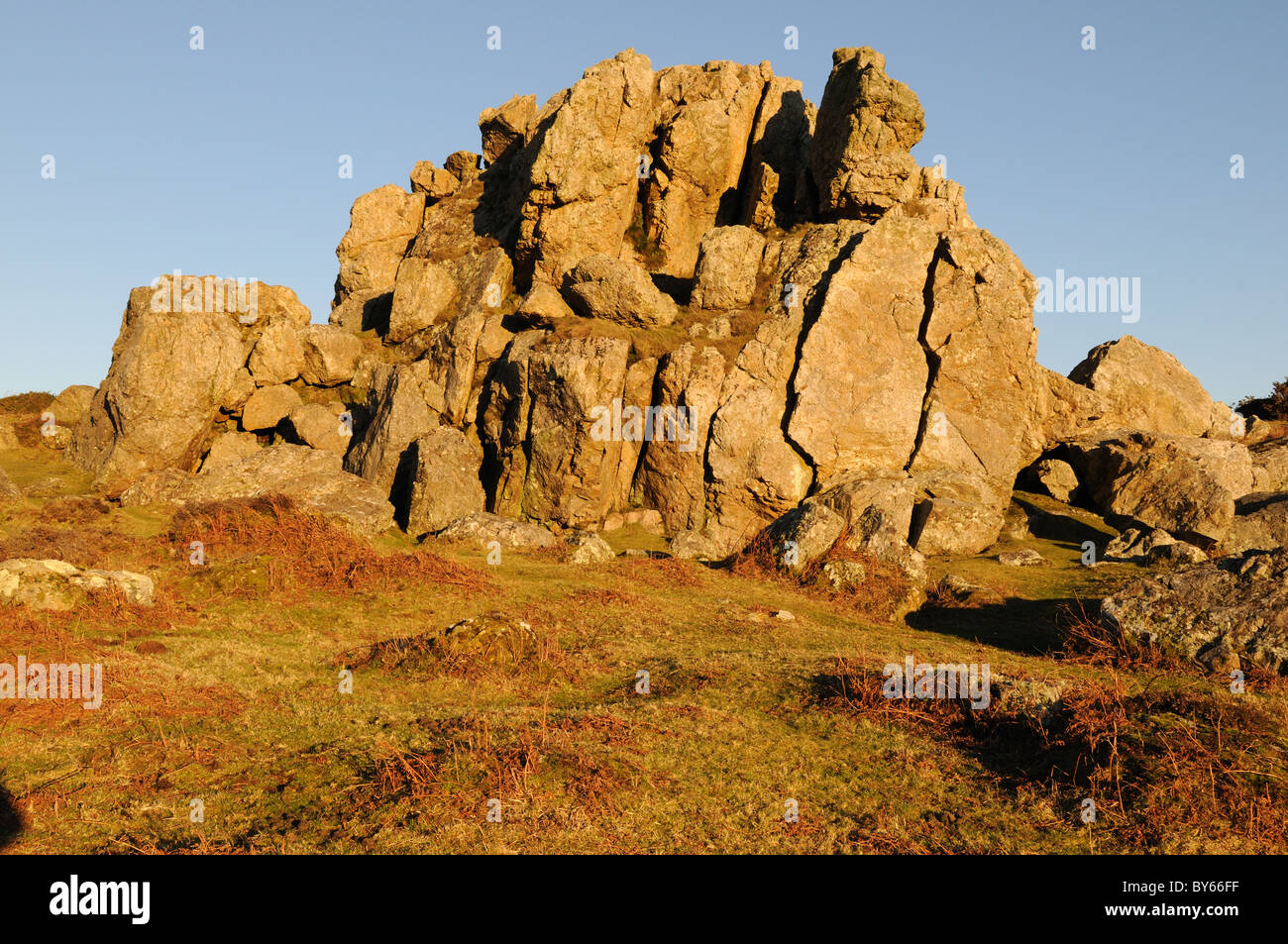Rocky Outcrop of Spotted Dolerite at sunset Plumstone Moutain Pembrokeshire Wales Cymru UK GB Stock Photo