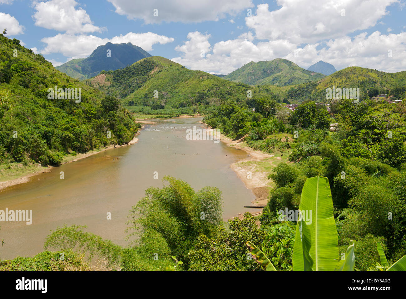 View of the Lokoho River and tropical landscape along the Sambava-Andapa road in Antsiranana province, northeast Madagascar. Stock Photo