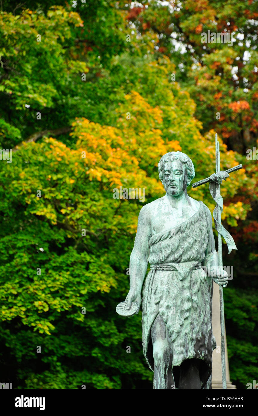 An old man statue in cemetery Stock Photo Alamy