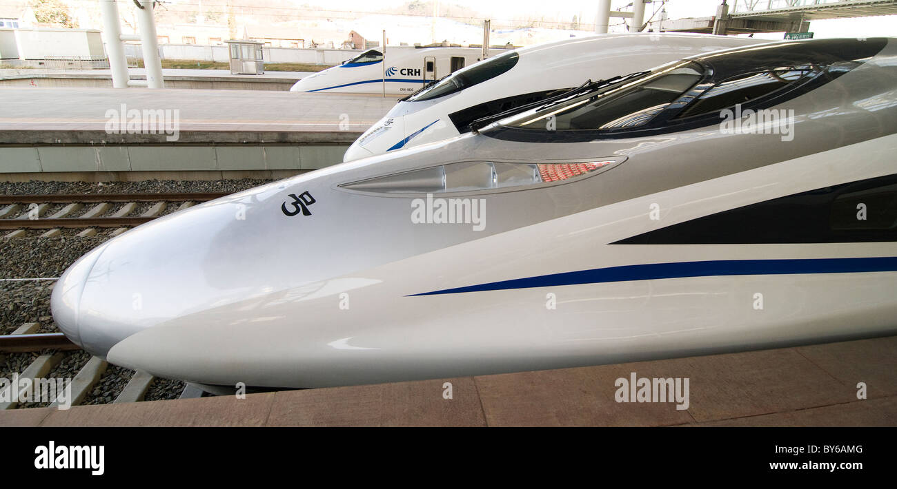 Super new Chinese bullet trains at Nanjing railway station. Stock Photo