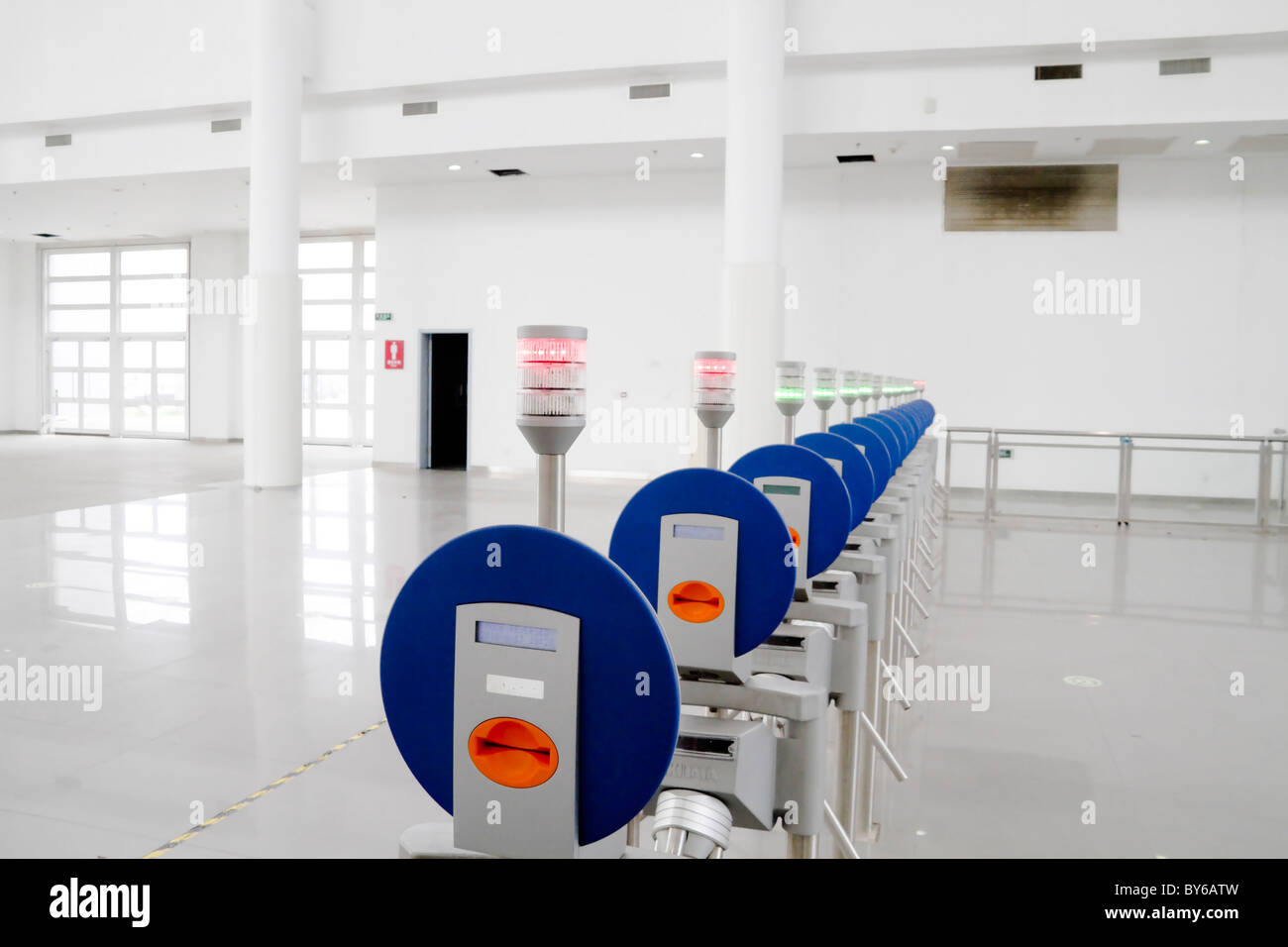 Modern turnstile entrance on a hall Stock Photo - Alamy