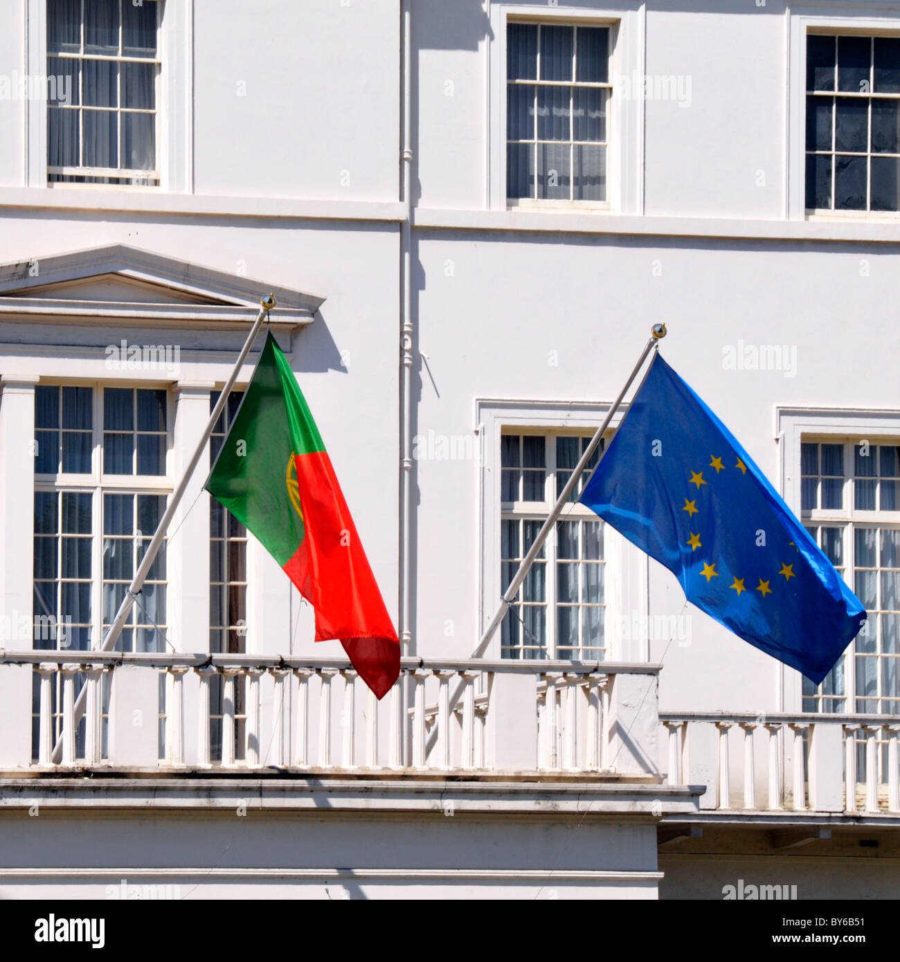 Exterior Portuguese UK London England embassy building Portugal national flag and EU European supranational political and economic union emblem flag Stock Photo