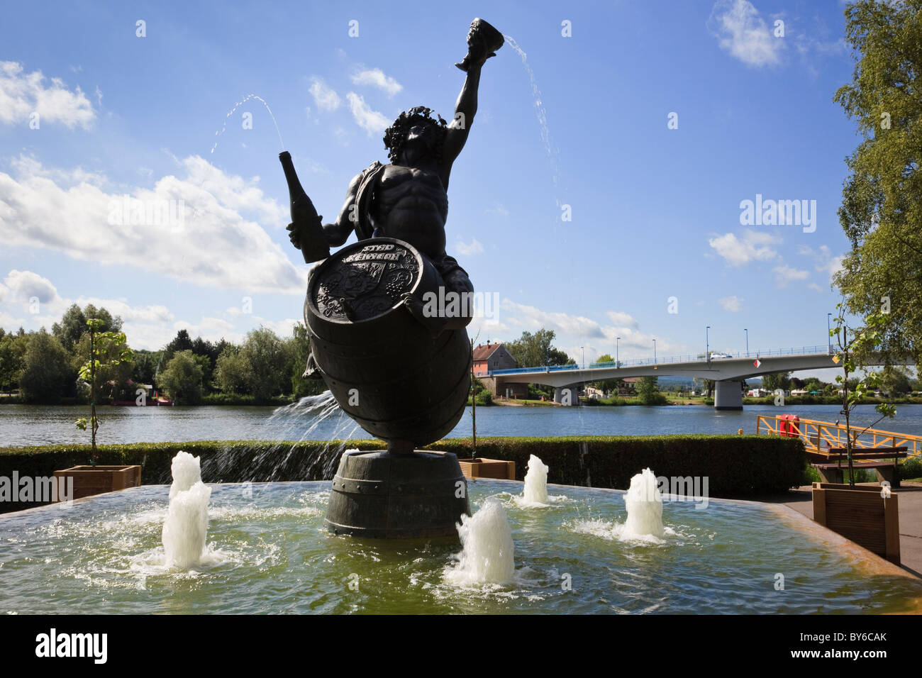 Remich, Grand Duchy of Luxembourg, Europe. Bacchus statue on Moselle River esplanade on border with Germany Stock Photo