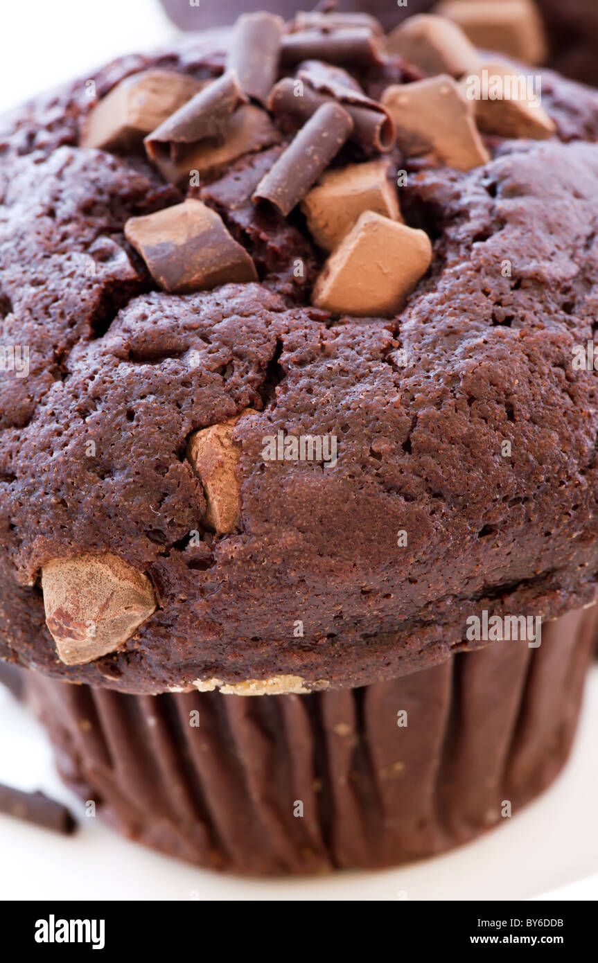 Chocolate muffin as closeup on white background Stock Photo - Alamy