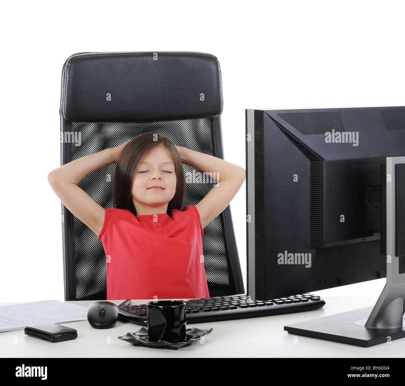 girl in the office in front of computer Stock Photo