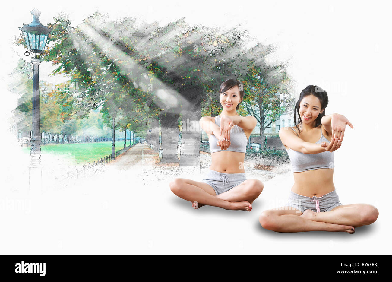 women exercising yoga together Stock Photo