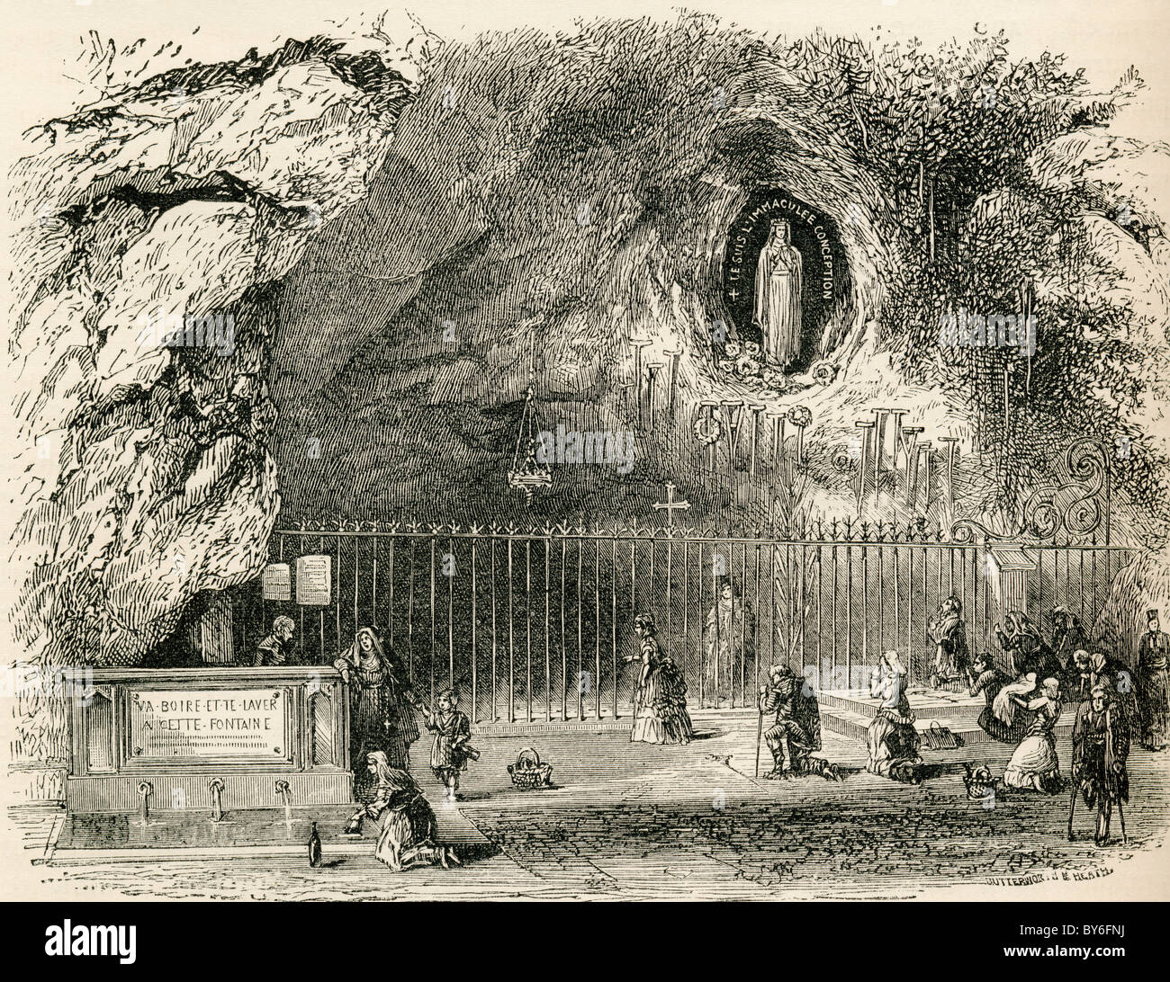 Grotto of Massabielle in the Sanctuary of Our Lady of Lourdes, France in the 19th century. Stock Photo