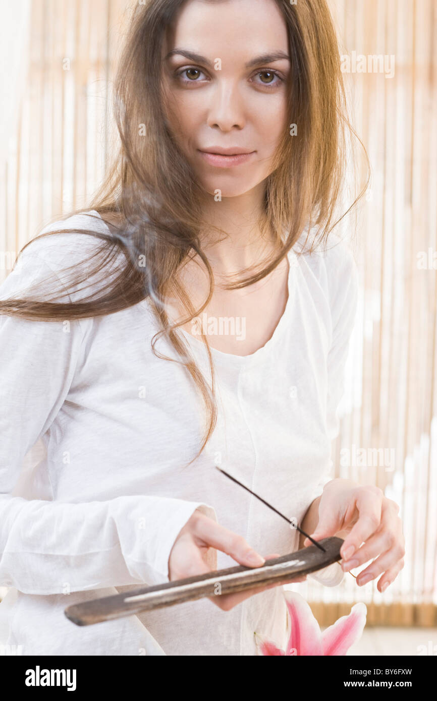 Incense woman hold hi-res stock photography and images - Alamy