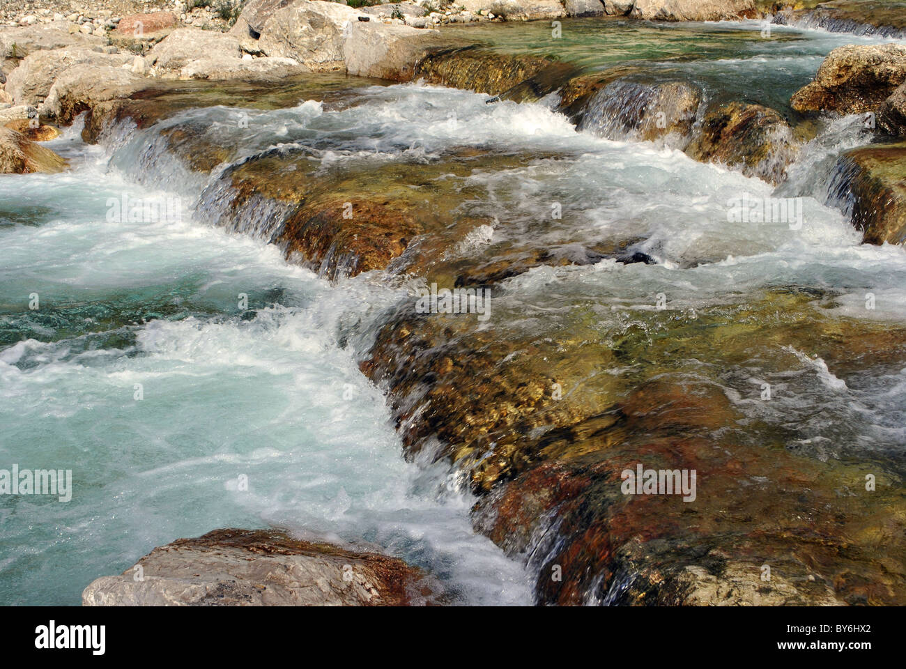 clear mountain river with a waterfall Stock Photo