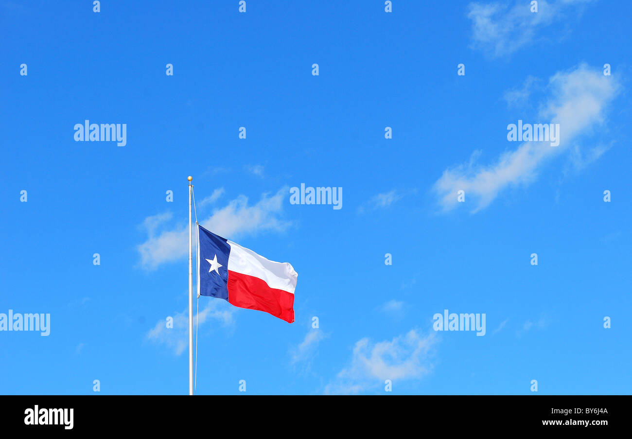 Texas flag flying high in the sky Stock Photo Alamy